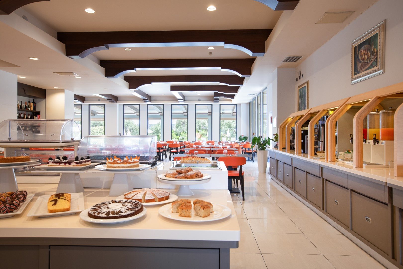 Buffet counter of cakes and pastries in a hotel breakfast room